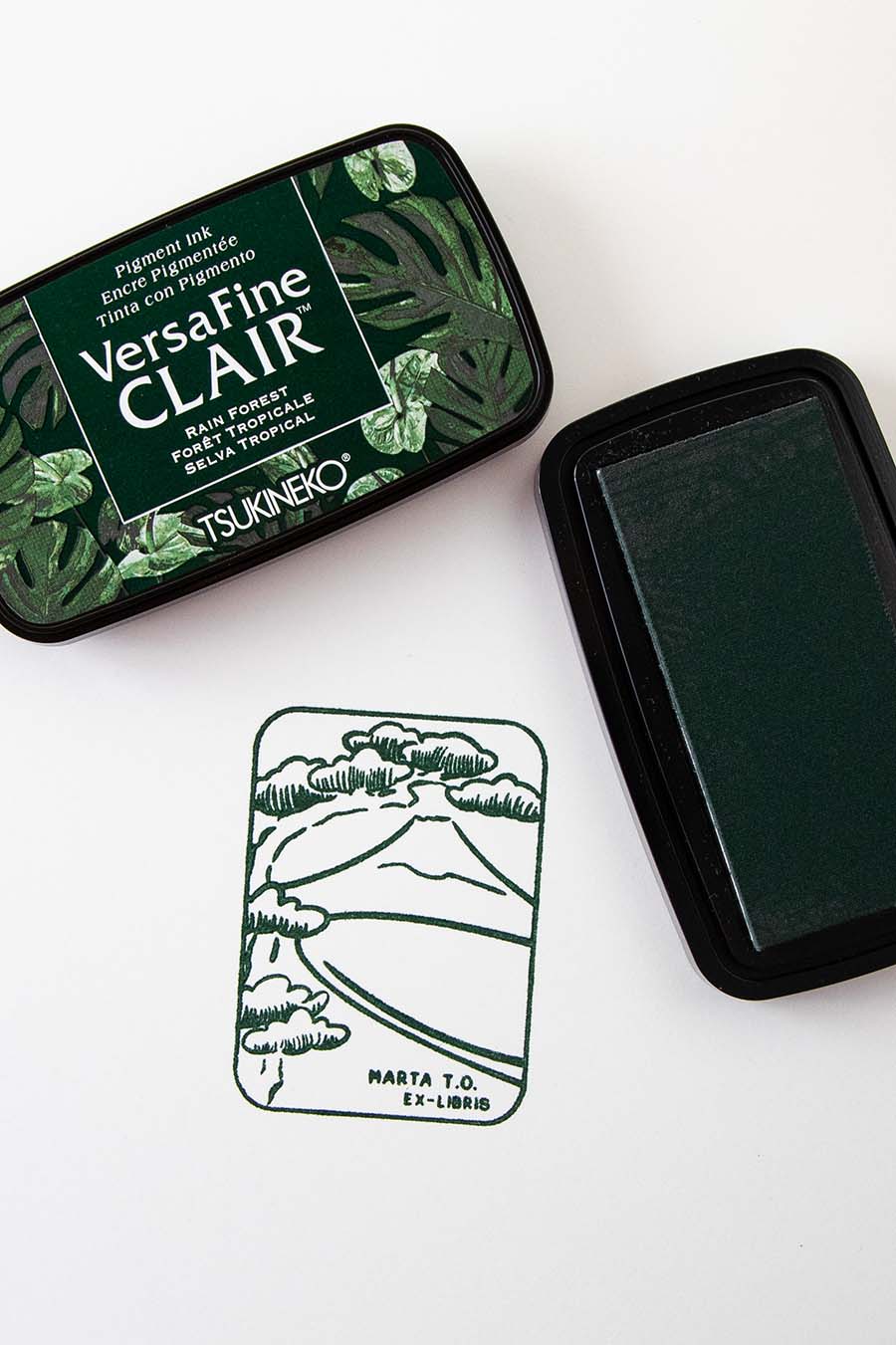 Almohadilla de tinta verde y exlibris